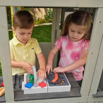 KidKraft Patio Party Wooden Outdoor Playhouse With Spinner Block Puzzle - 14pc 4 KidKraft Patio Party Wooden Outdoor Playhouse With Spinner Block Puzzle - 14pc - Image 4