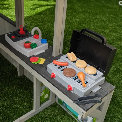 KidKraft Patio Party Wooden Outdoor Playhouse With Spinner Block Puzzle - 14pc 7 KidKraft Patio Party Wooden Outdoor Playhouse With Spinner Block Puzzle - 14pc - Image 7