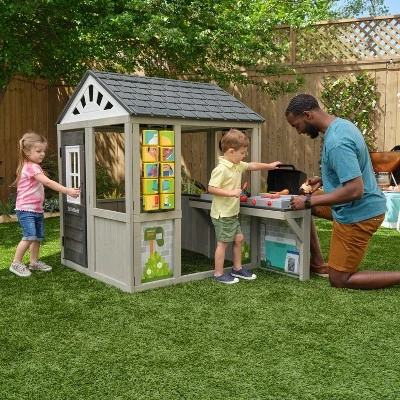 KidKraft Patio Party Wooden Outdoor Playhouse With Spinner Block Puzzle - 14pc 1 KidKraft Patio Party Wooden Outdoor Playhouse With Spinner Block Puzzle - 14pc